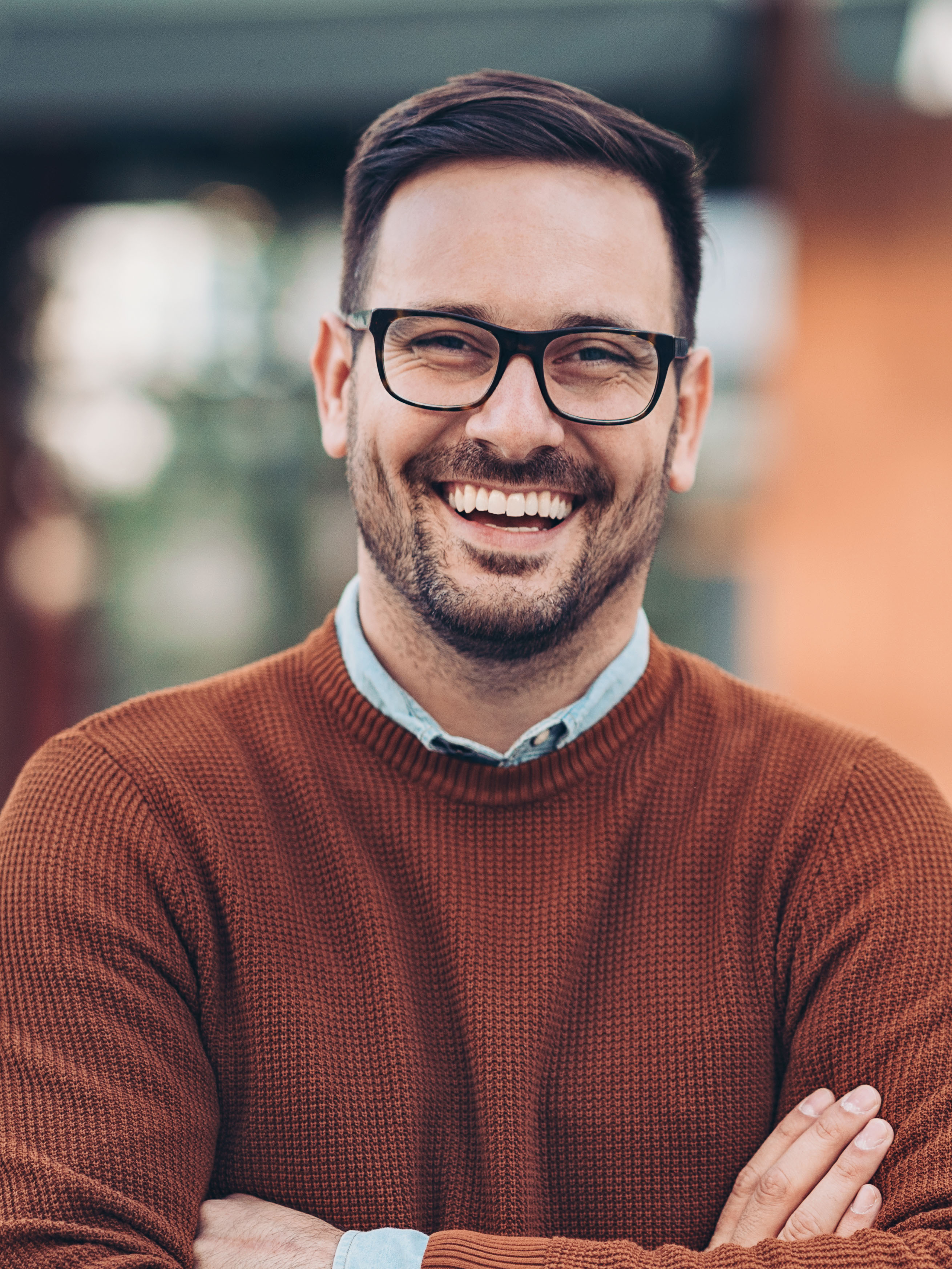 Smiling man outdoors in the city